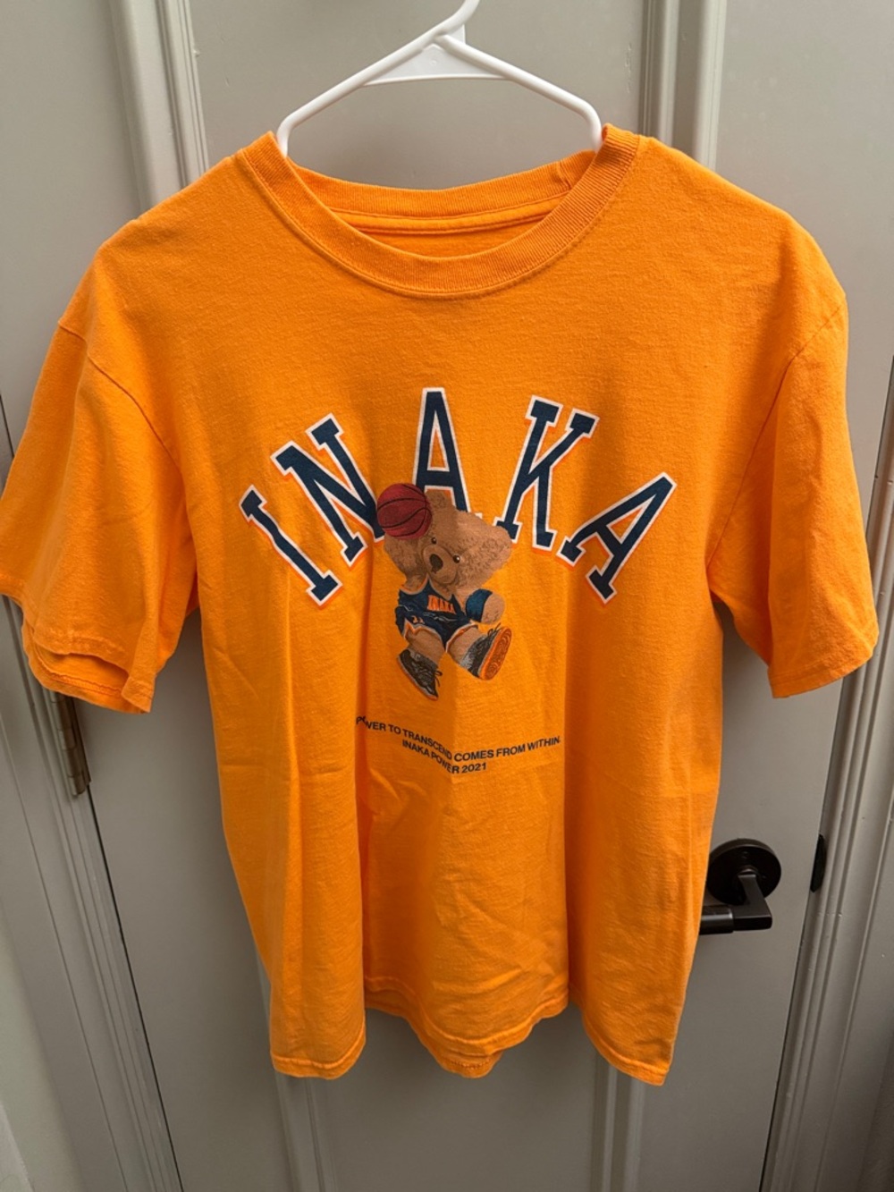 Inaka Power Orange Men’s Graphic Tee with Basketball Bear
